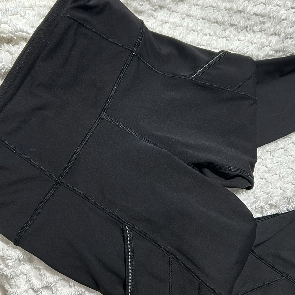 Lululemon black leggings. Size 4 with pockets. - Picture 9 of 11